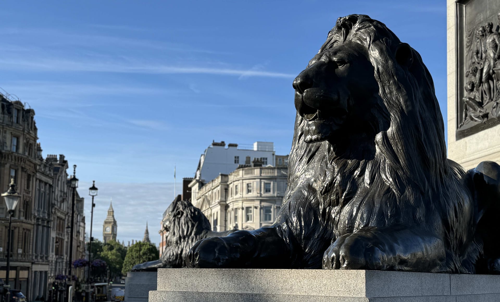 Sculptural stone lion overlooking Regent Street, Central London headquarters of Scottsdale IFA